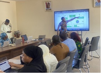 Raymond Akan familiarising Programme Officers with the KAAP tool as part of pre-deployment testing.