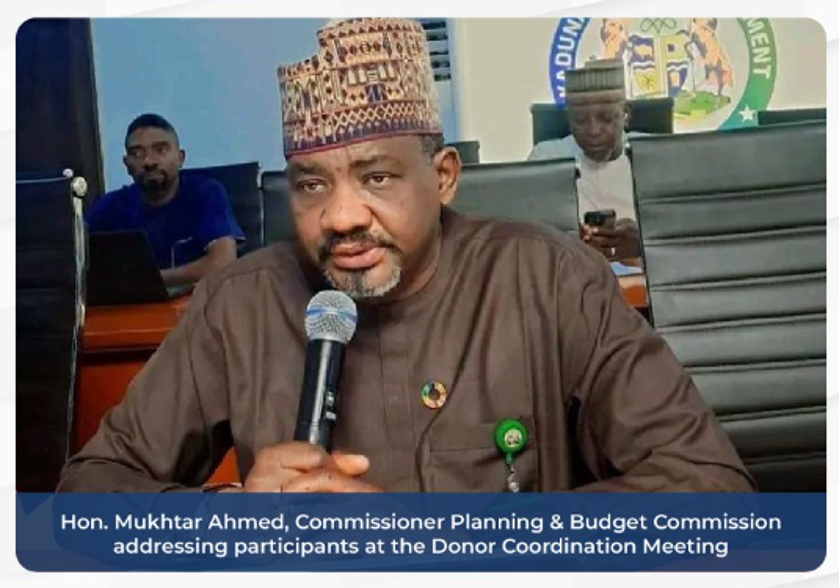 Hon. Mukhtar Ahmed, Commissioner Planning & Budget Commission addressing participants at the Donor Coordination Meeting